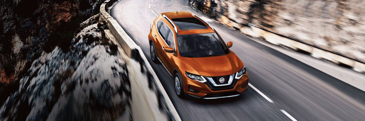 2020 Nissan Rogue driving down highway